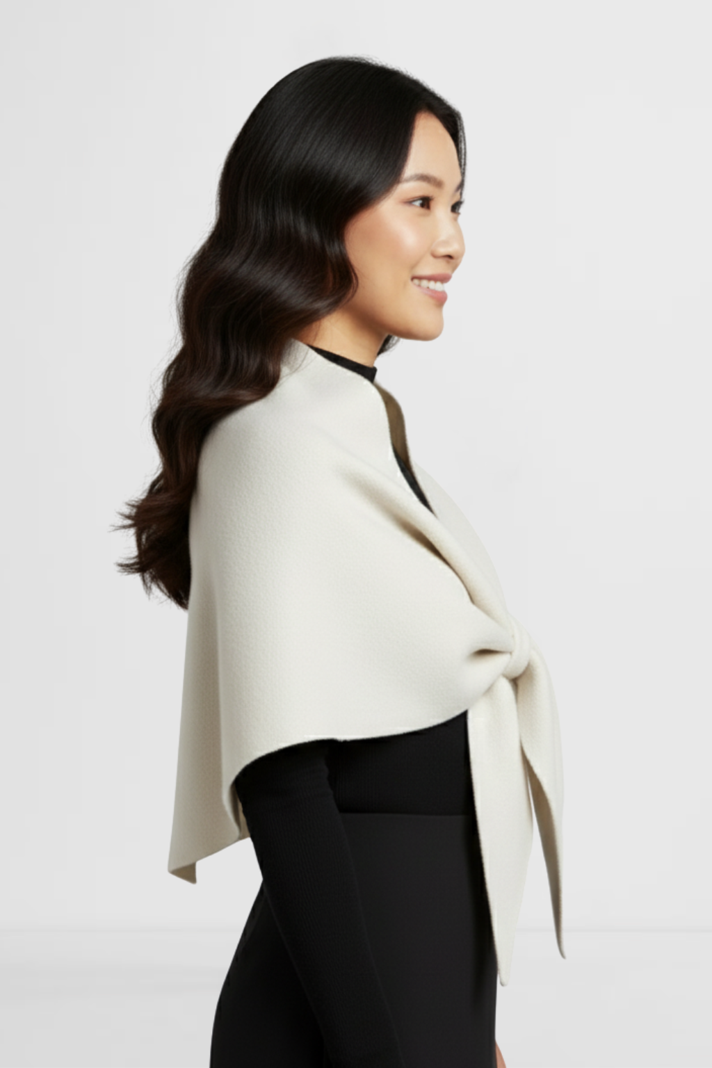 LOHNR The Loop Wrap in Ecru, a soft polished fall layering wrap featuring a smooth drape and signature tie-front design.