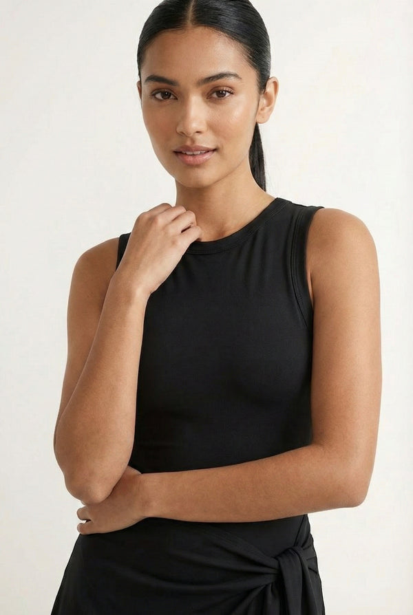 LOHNR The Rally Dress in Black - Athletic one-piece romper with side-tie wrap skirt and hidden integrated shorts