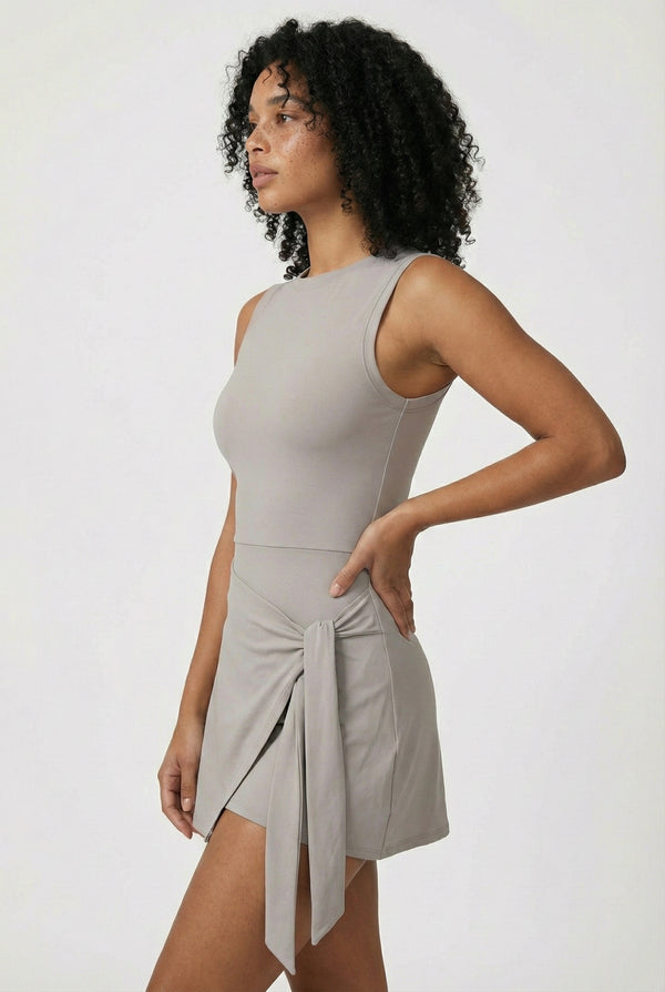 LOHNR The Rally Dress in Gray - Athletic one-piece romper with side-tie wrap skirt and hidden integrated shorts