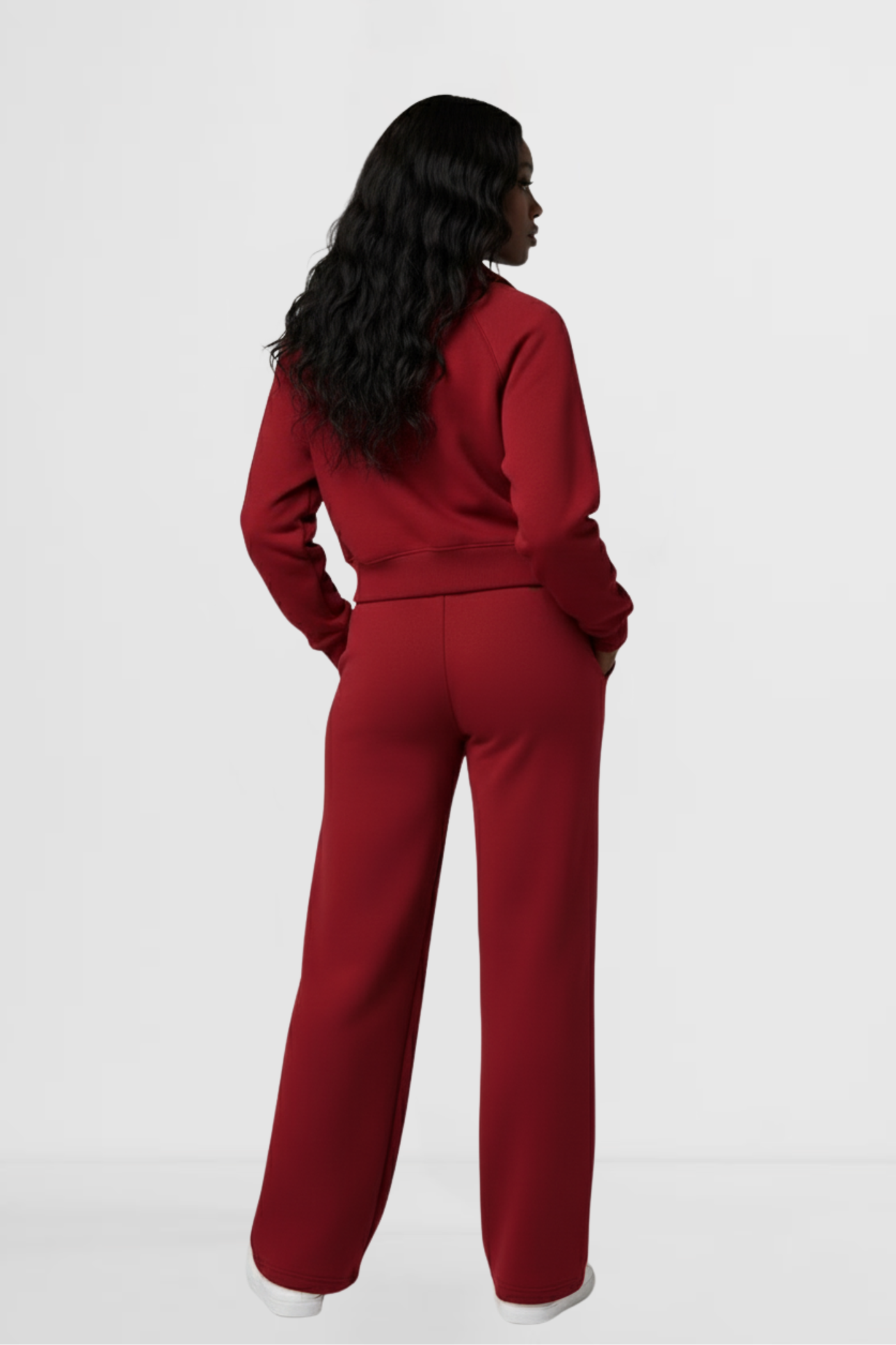 Model wearing the LOHNR Ventura Set in Merlot, a premium soft scuba matching set featuring a sculpted V-neck and wide-leg pants for refined comfort.