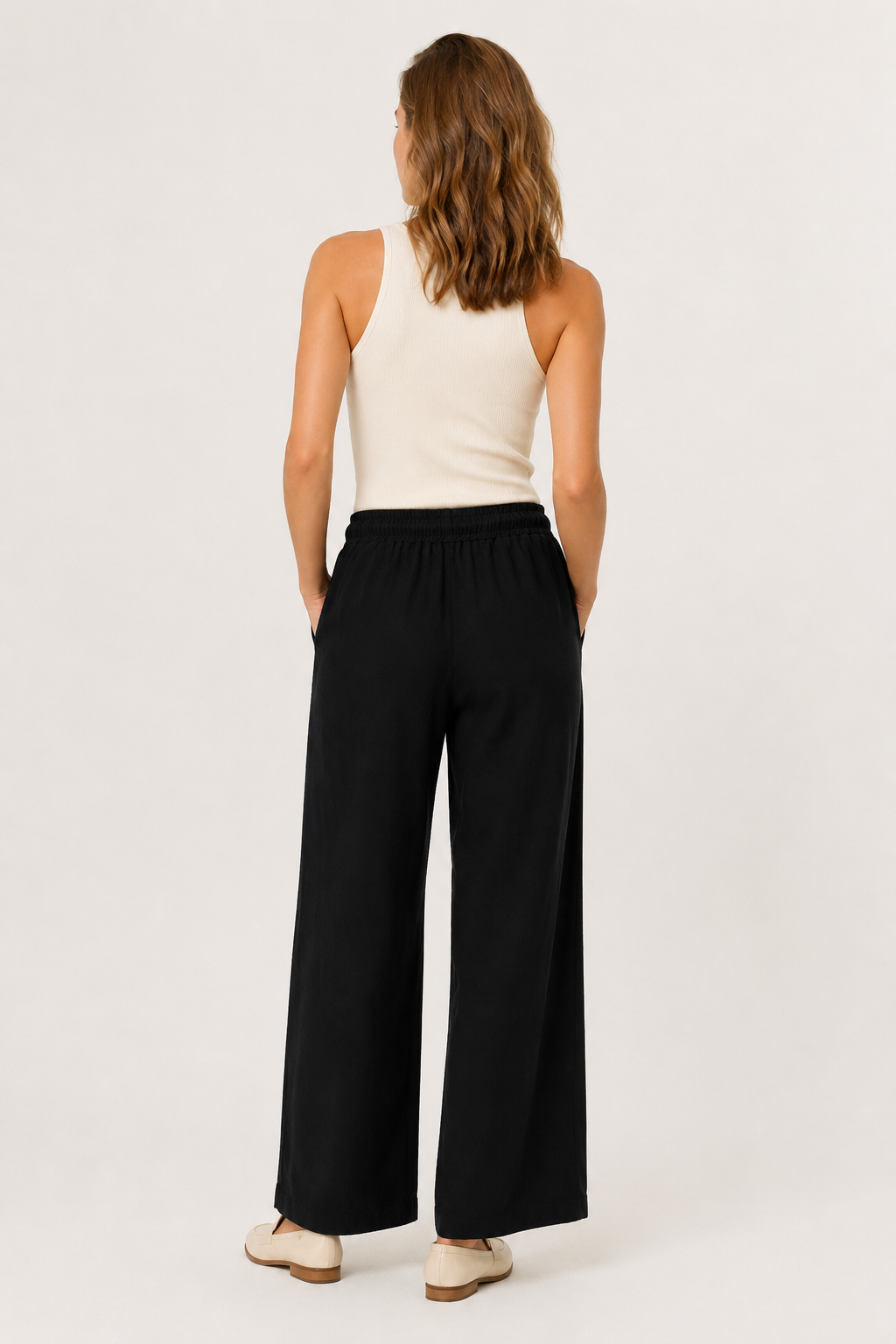 Woman wearing premium minimalist wide leg lounge pants