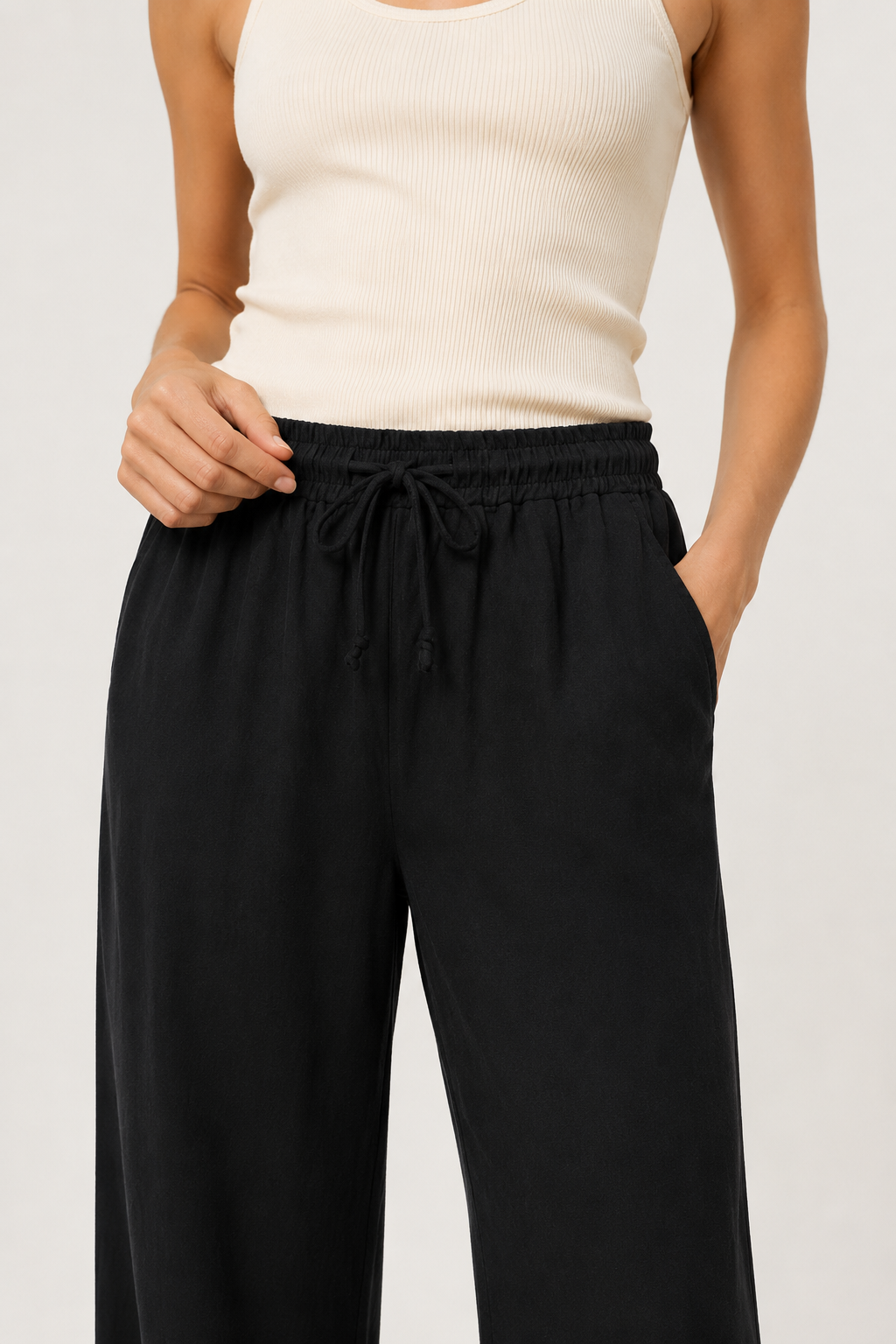 Woman wearing premium minimalist wide leg lounge pants