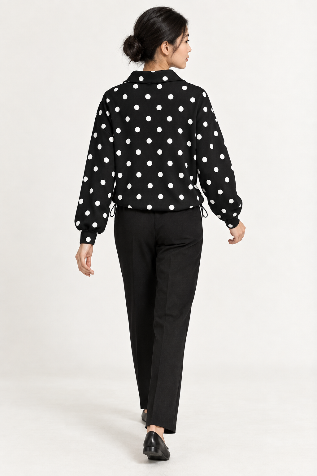 Pippa Polka-Dot Half-Zip in Black, back step view on an adult model.