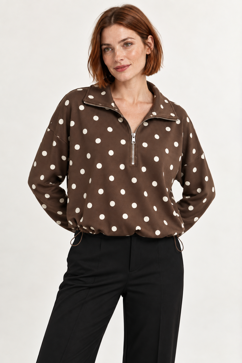 Pippa Polka-Dot Half-Zip in Brown, front weight shift view on an adult model.