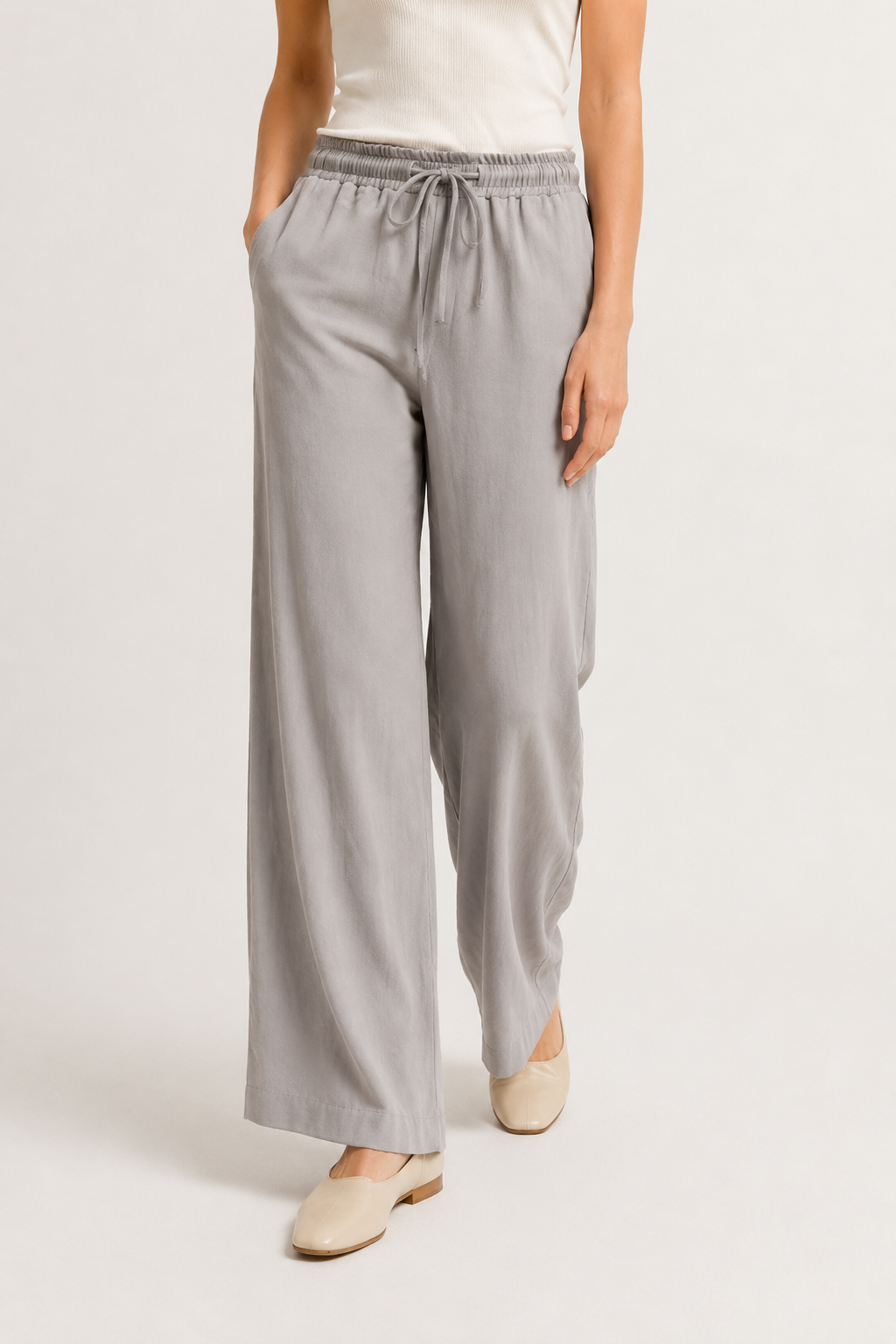 Woman wearing premium minimalist wide leg lounge pants