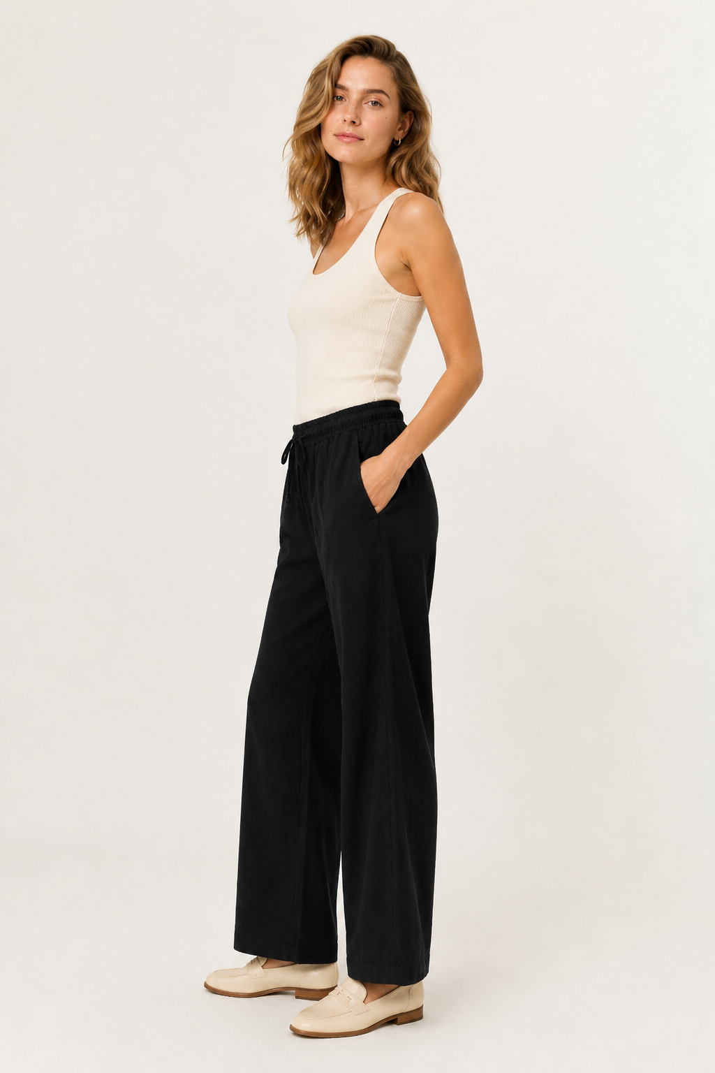 Woman wearing premium minimalist wide leg lounge pants
