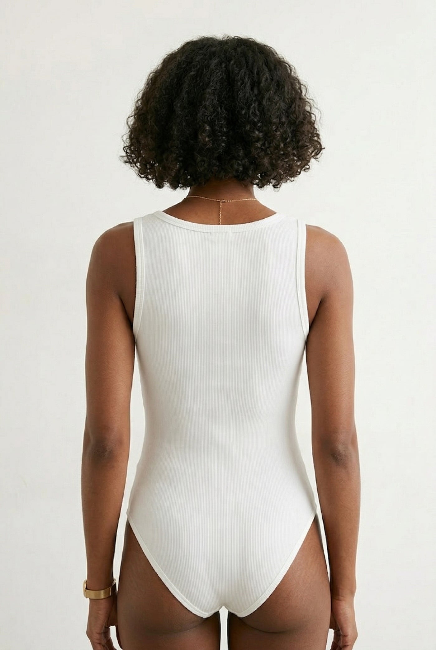 Model wearing a Pure White square neck one-piece swimsuit