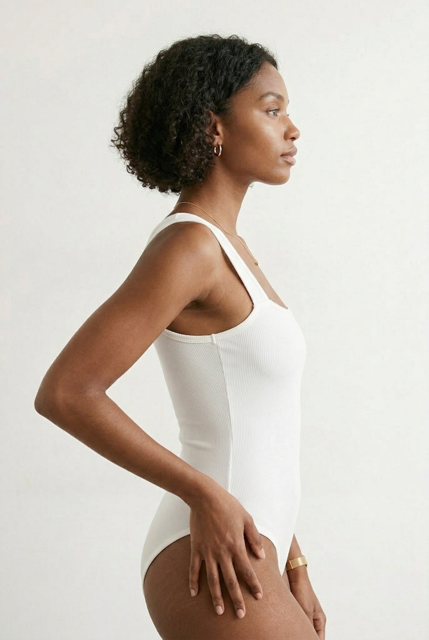 Model wearing a Pure White square neck one-piece swimsuit