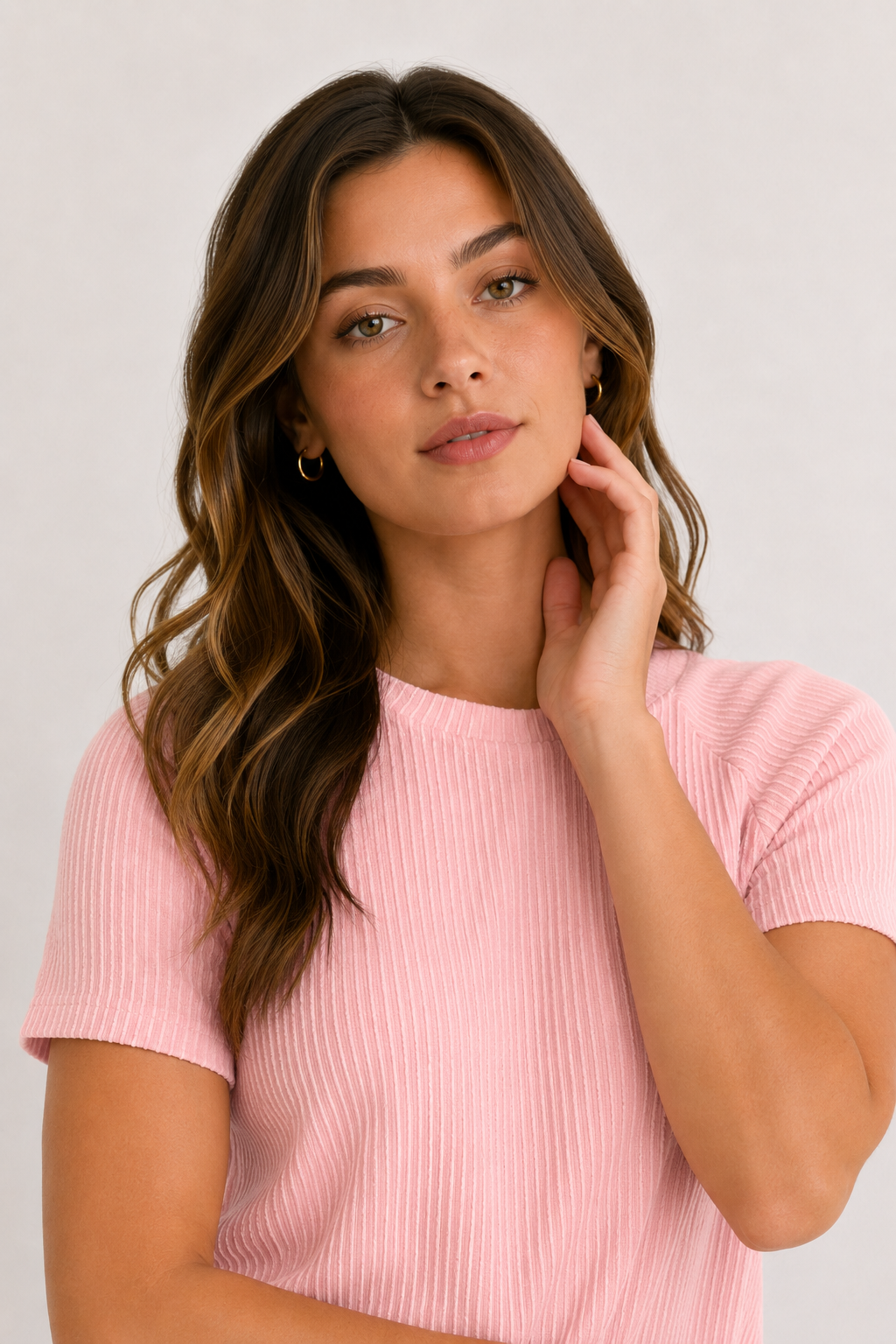 Woman wearing a rosewater short sleeve top and matching mini skirt lounge set.