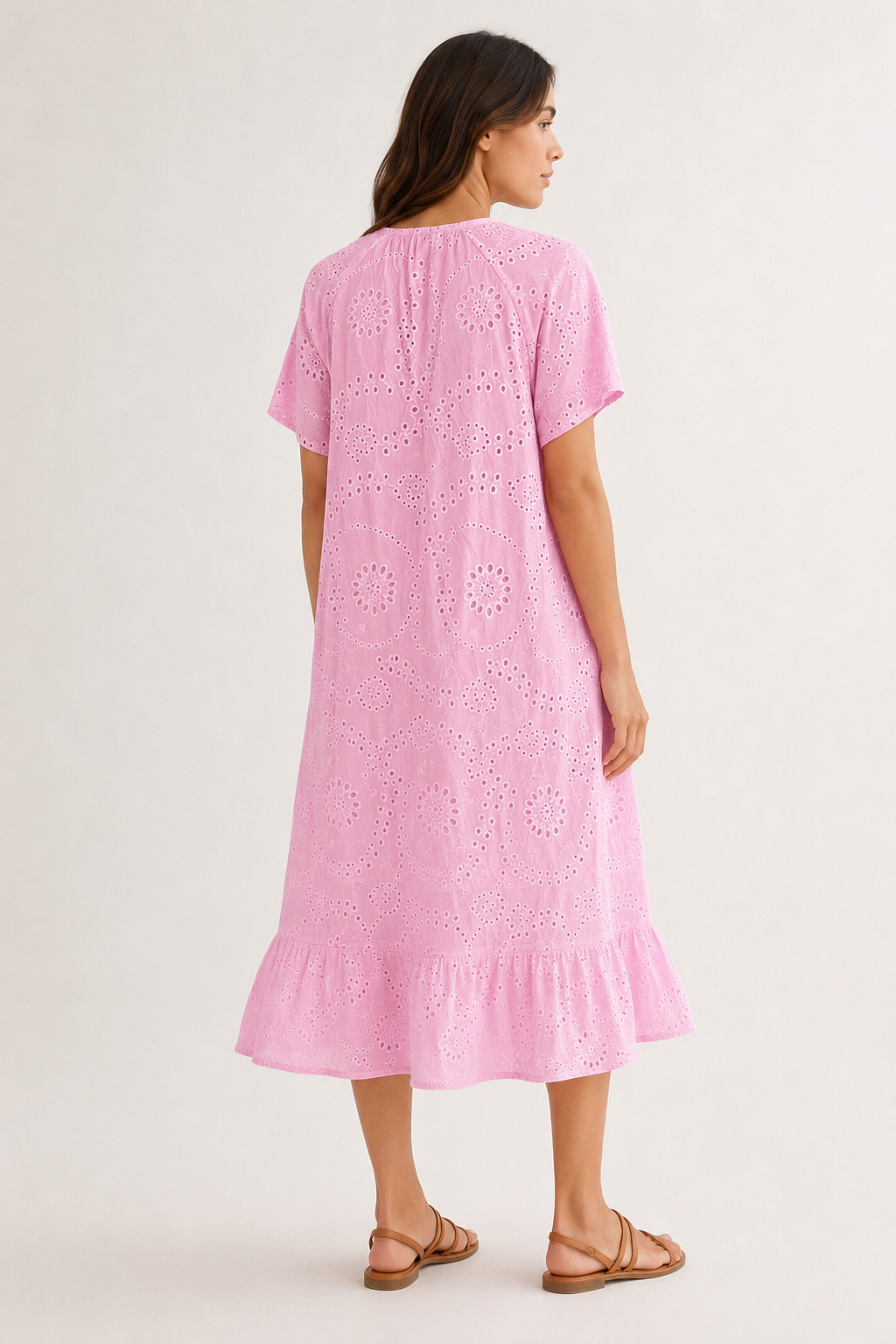 Woman modeling a short-sleeve v-neck midi dress in bright pink Azalea
