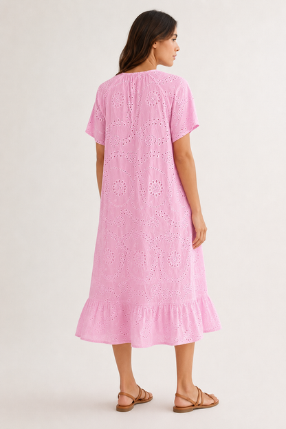 Woman modeling a short-sleeve v-neck midi dress in bright pink Azalea