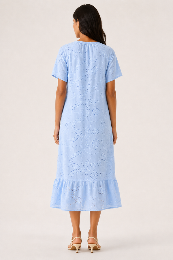 Woman modeling a short-sleeve v-neck midi dress in light blue Celeste