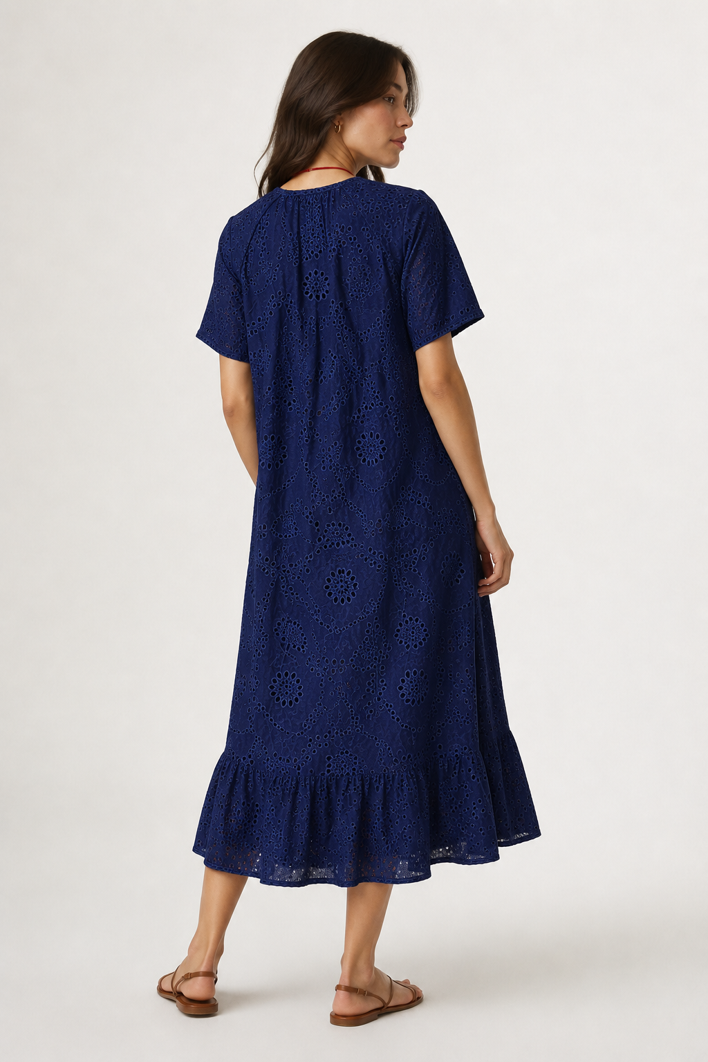 Woman modeling a short-sleeve v-neck midi dress in dark navy Total Eclipse