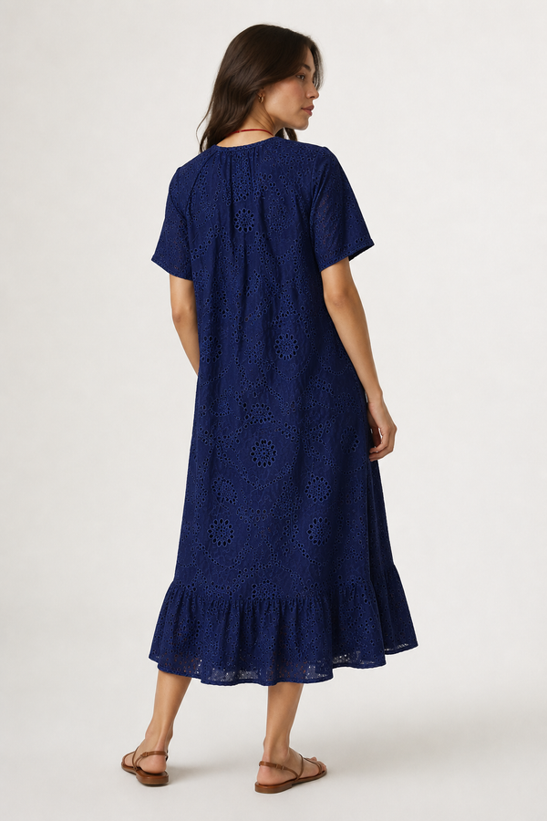 Woman modeling a short-sleeve v-neck midi dress in dark navy Total Eclipse