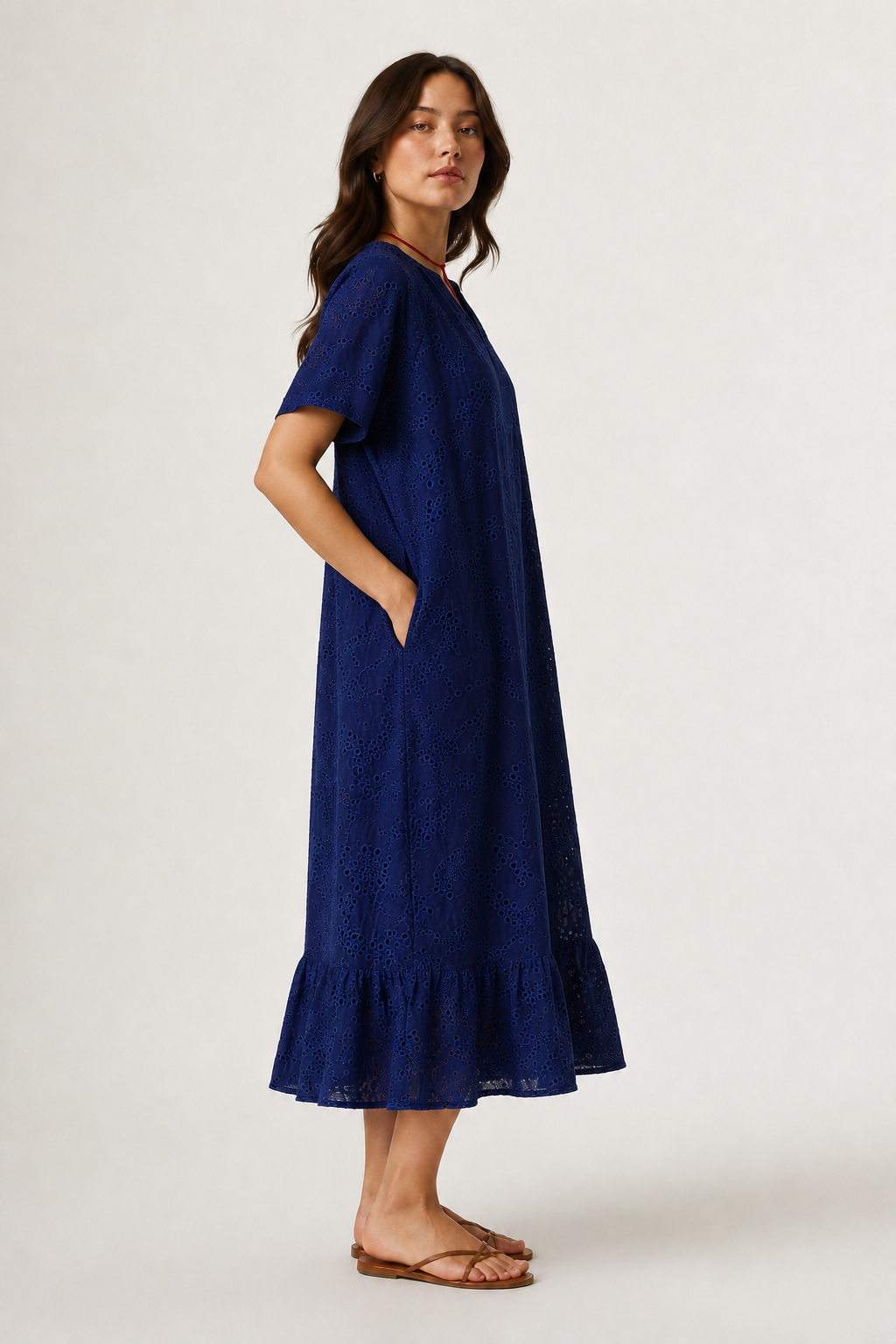 Woman modeling a short-sleeve v-neck midi dress in dark navy Total Eclipse