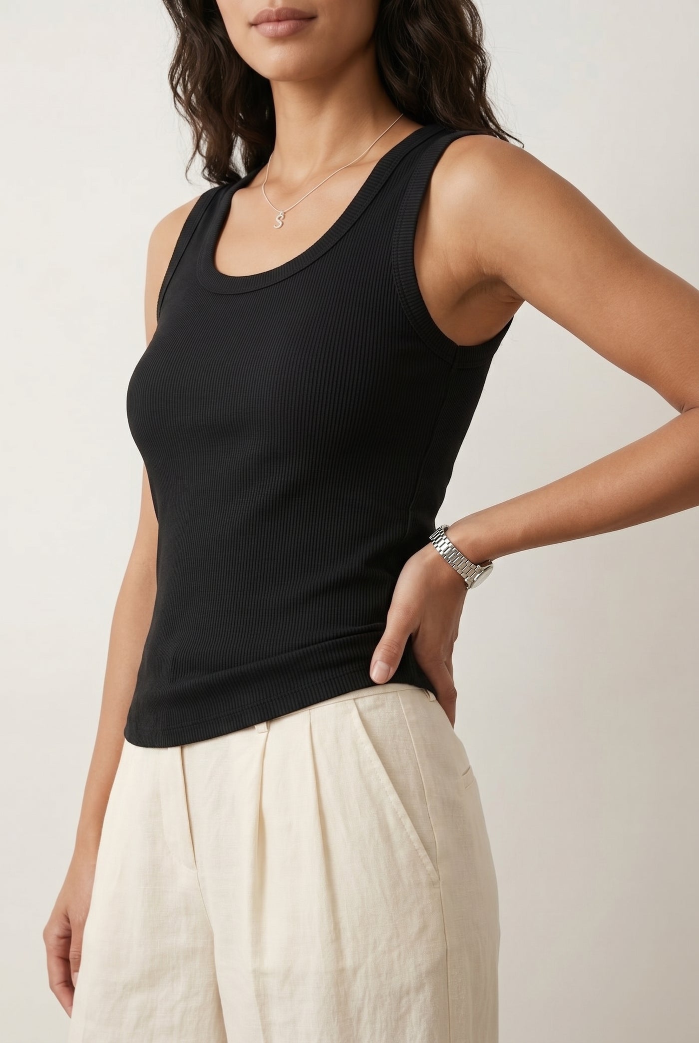 Woman wearing the Staple Scoop Tank in black Onyx