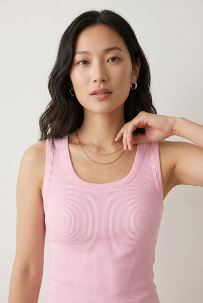 Woman wearing the Staple Scoop Tank in light pink Rosewater