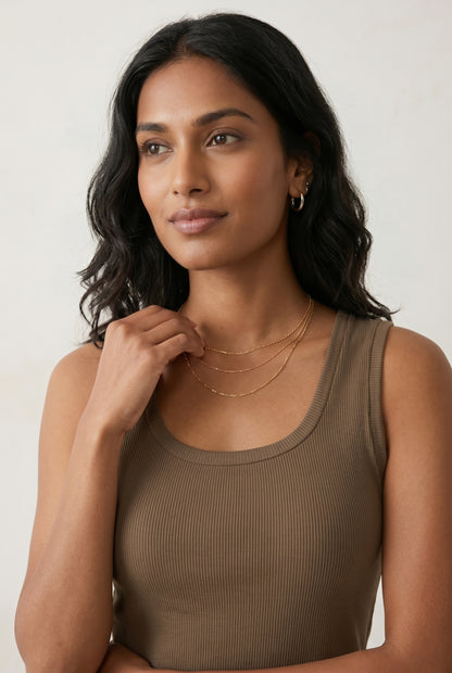 Woman wearing the Staple Scoop Tank in brown Truffle