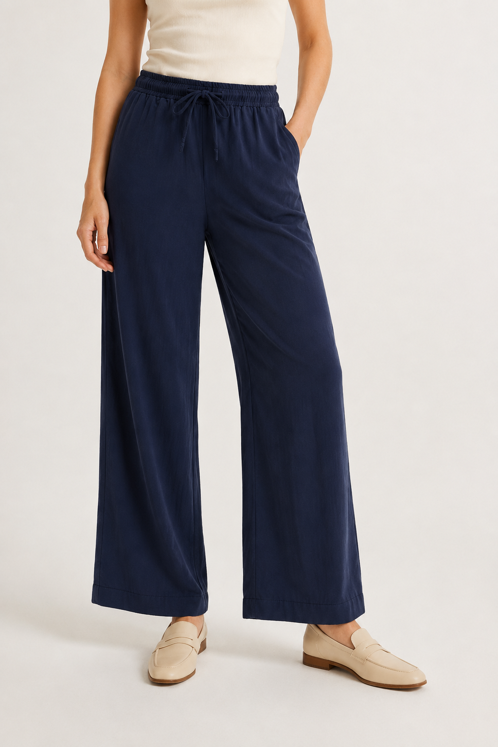 Woman wearing premium minimalist wide leg lounge pants