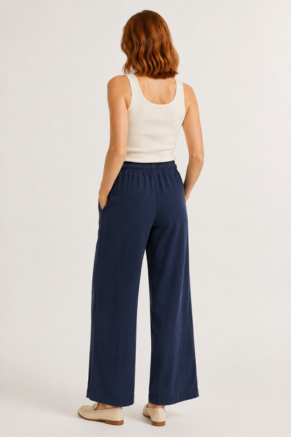 Woman wearing premium minimalist wide leg lounge pants