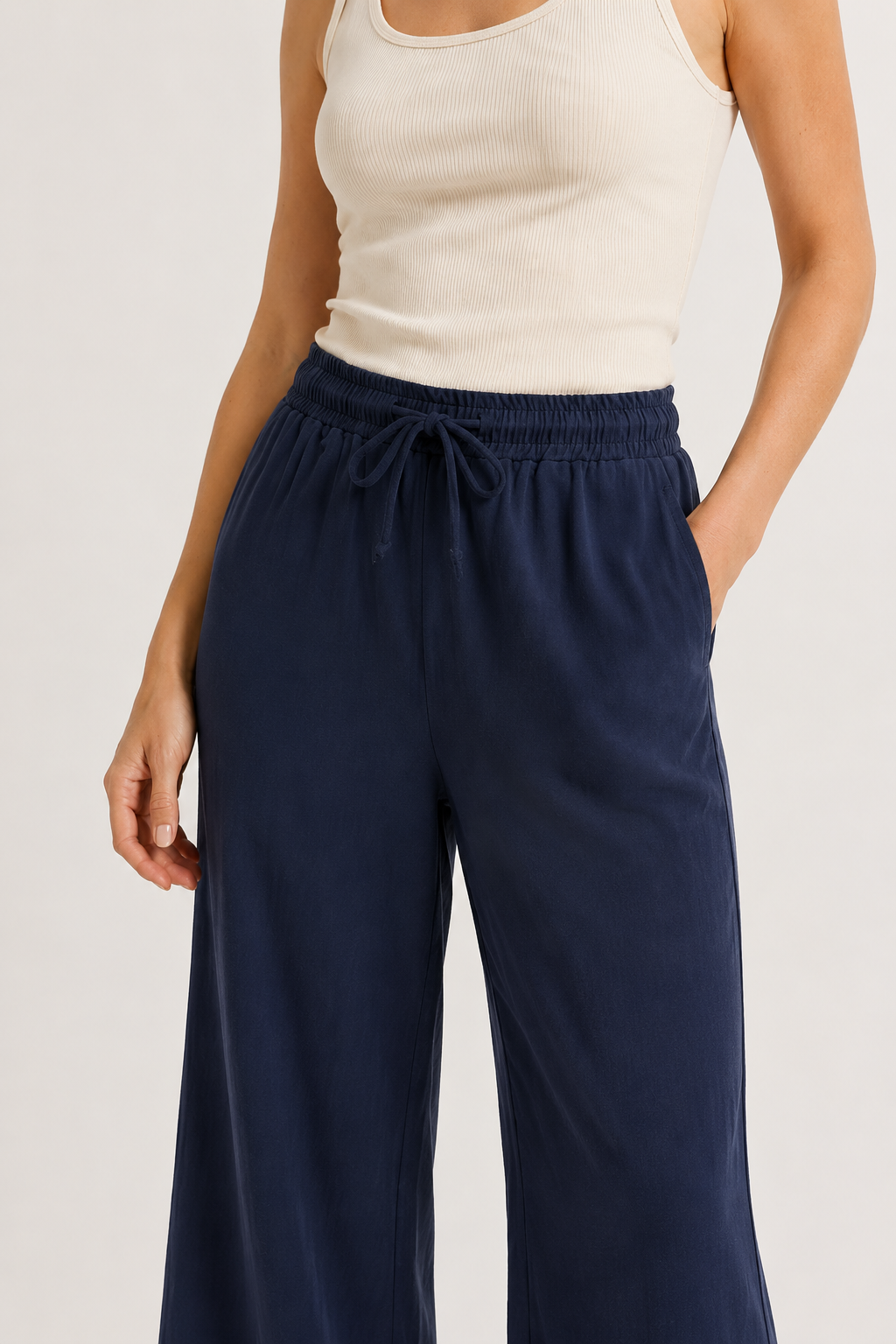 Woman wearing premium minimalist wide leg lounge pants