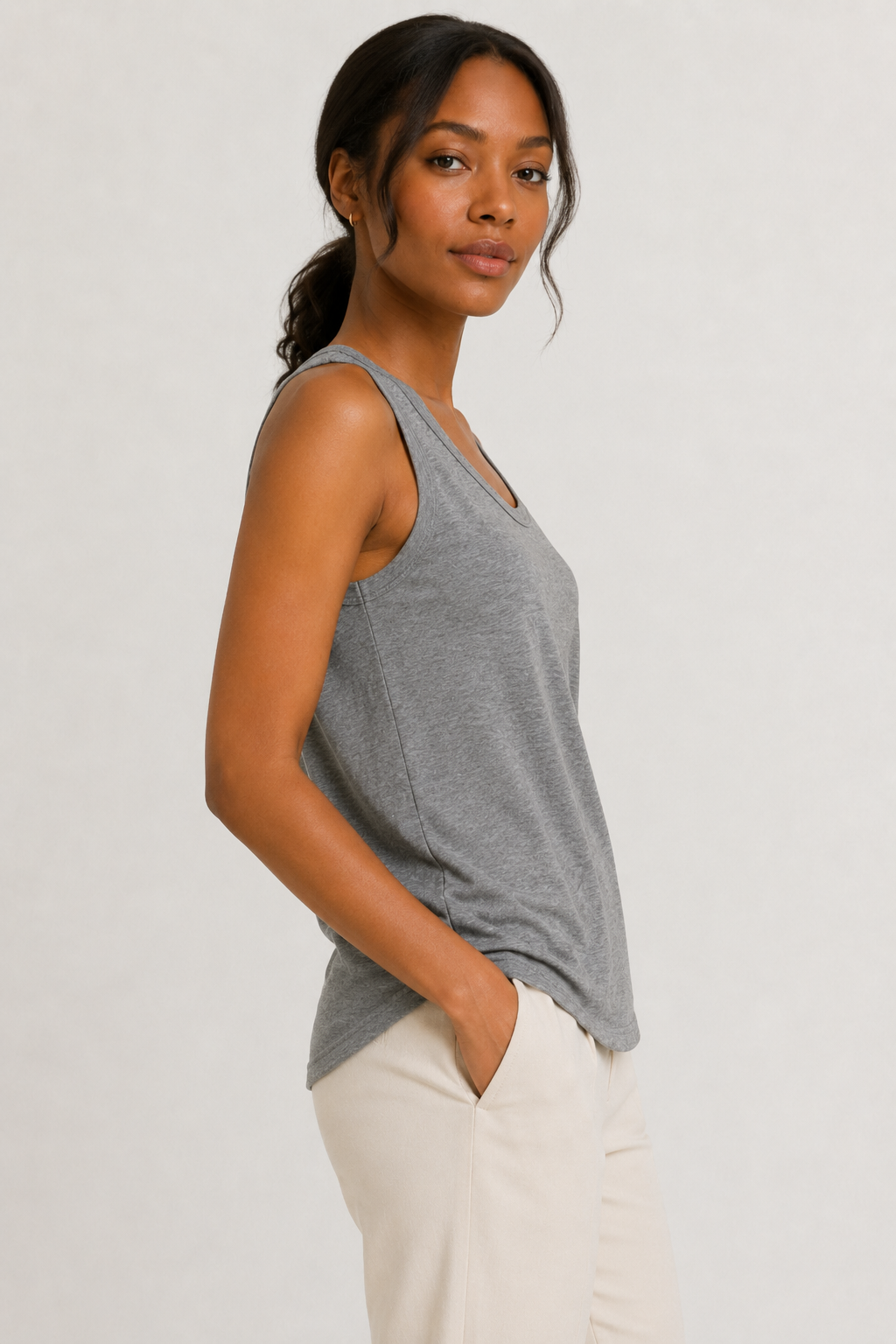Woman wearing the Lohnr Zarah Tank with a scoop neck and effortless fit