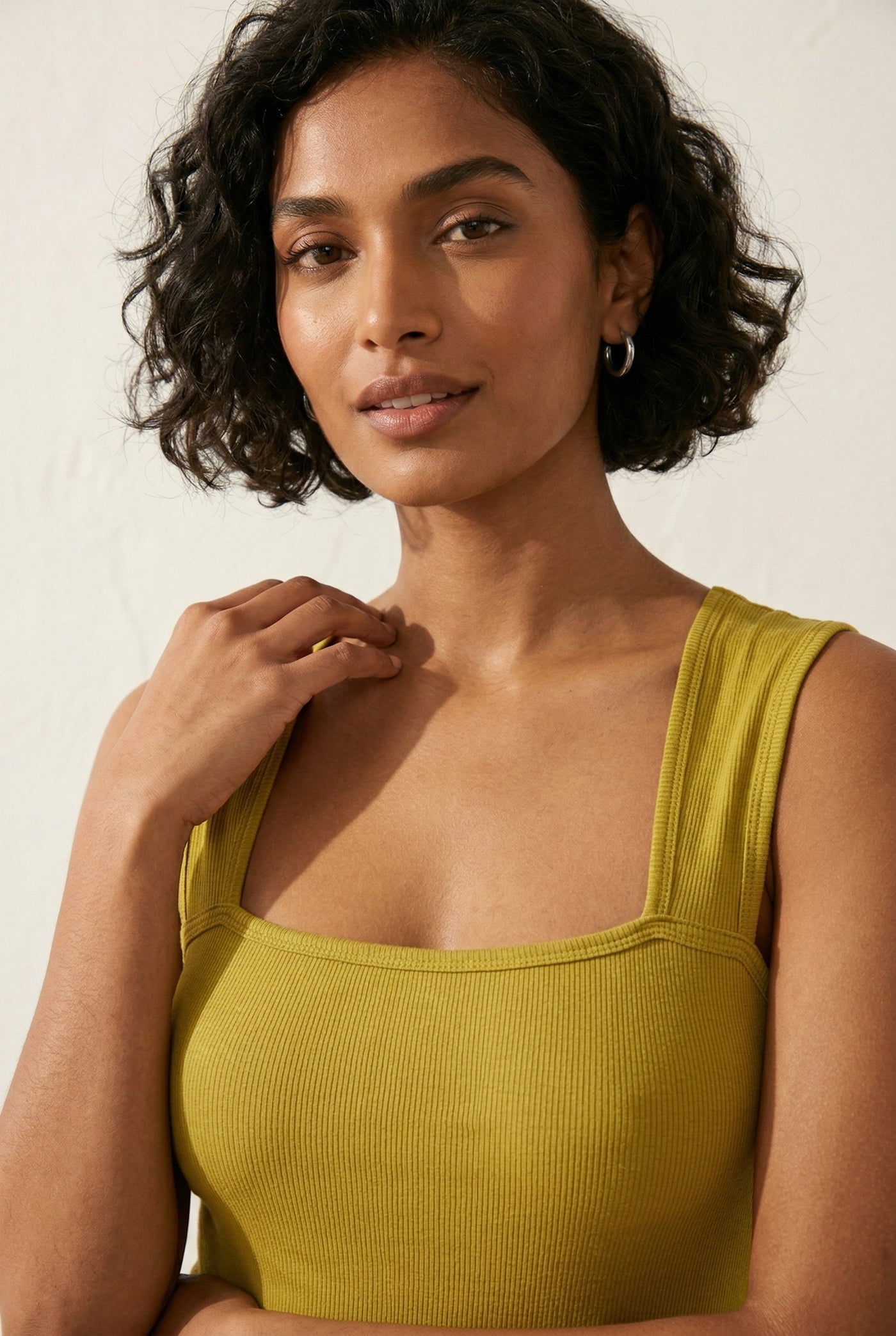 Model wearing a Fatigue olive green square neck one-piece swimsuit