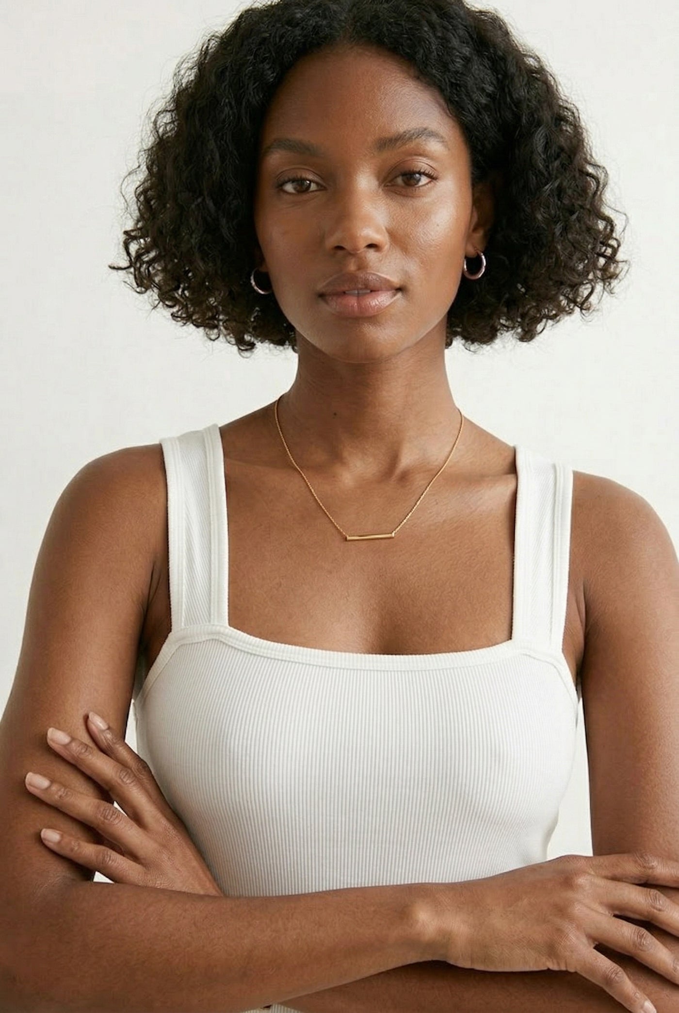 Model wearing a Pure White square neck one-piece swimsuit