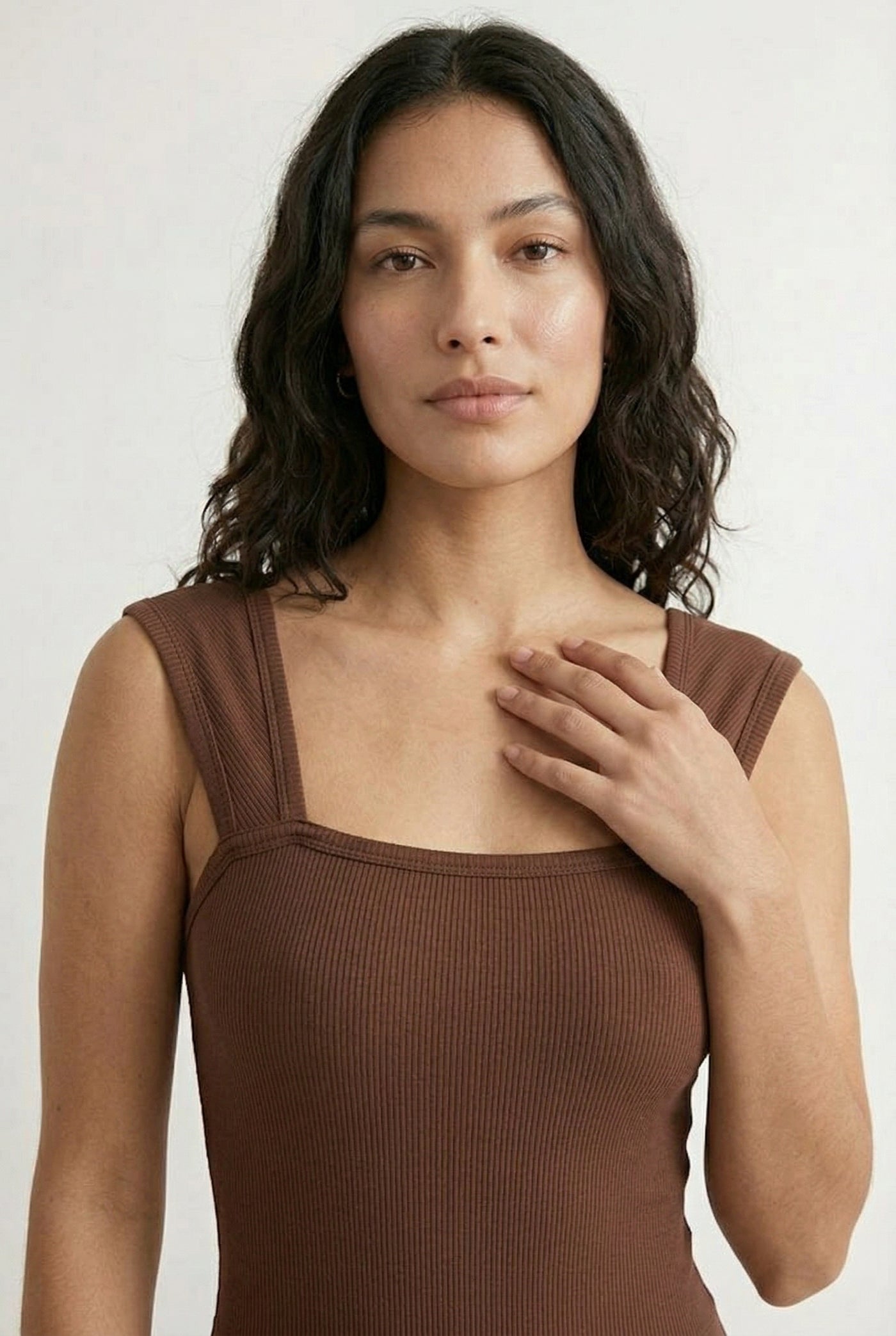 Model wearing a Rich Mocha brown square neck one-piece swimsuit