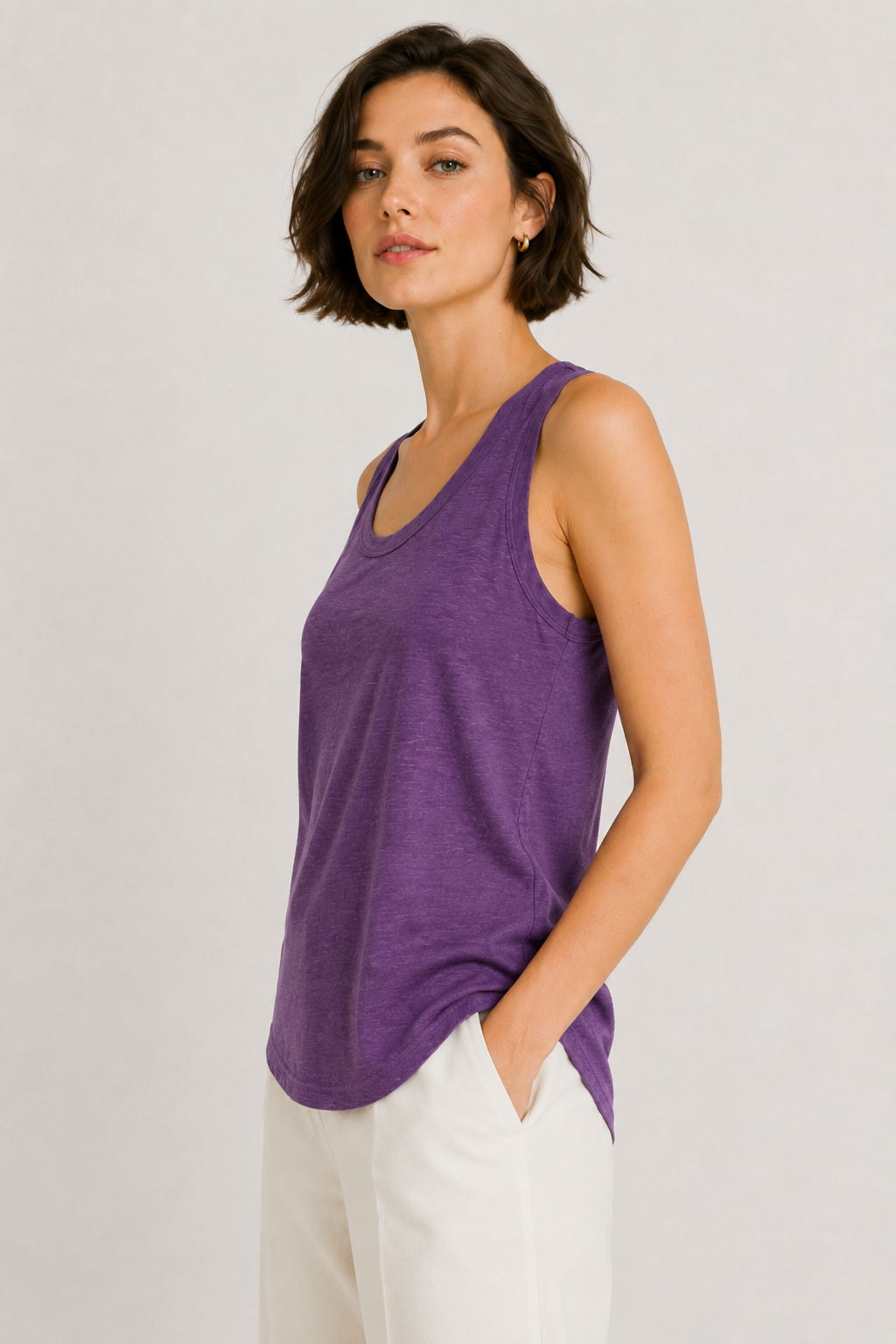 Woman wearing the Lohnr Zarah Tank with a scoop neck and effortless fit