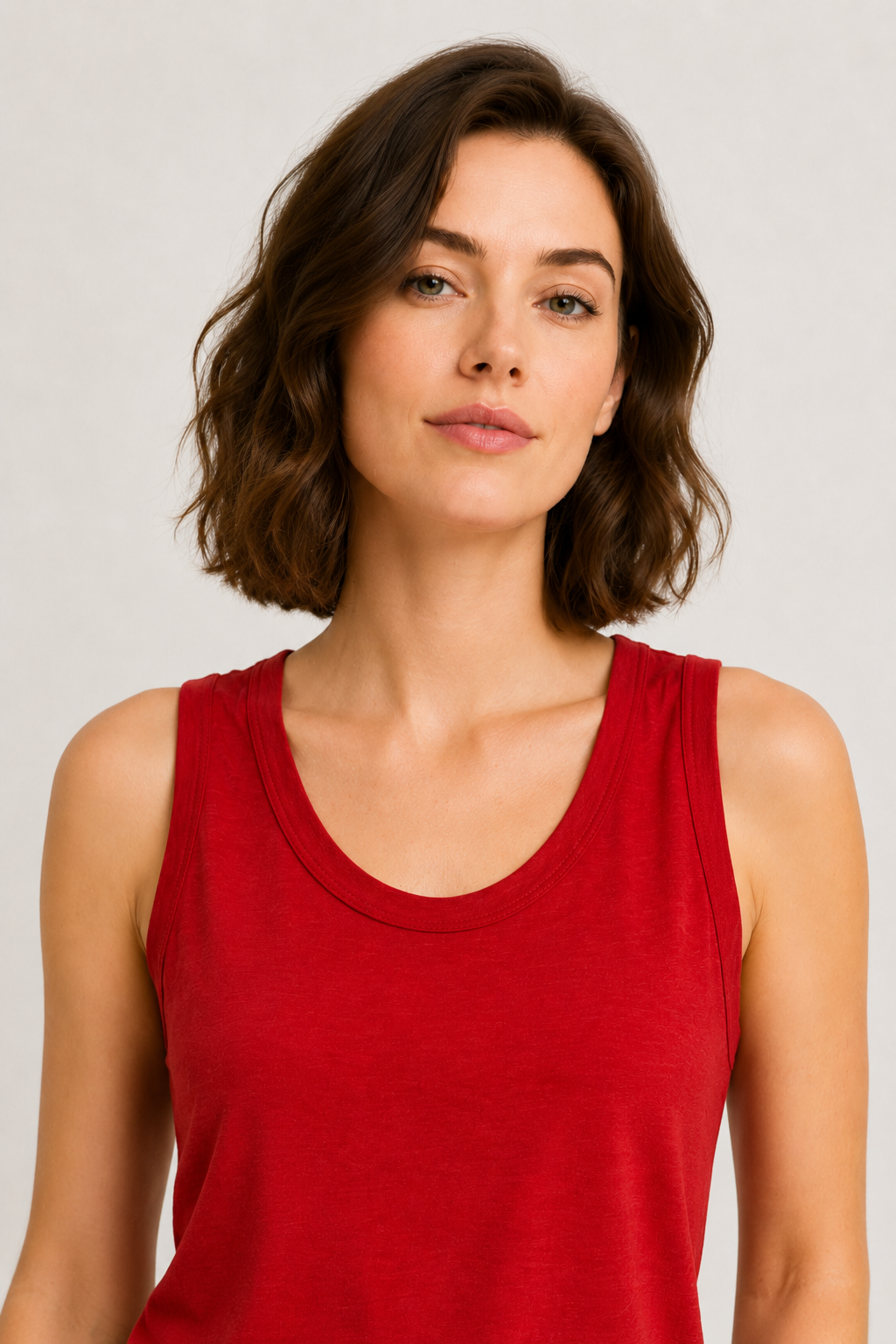 Woman wearing the Lohnr Zarah Tank with a scoop neck and effortless fit