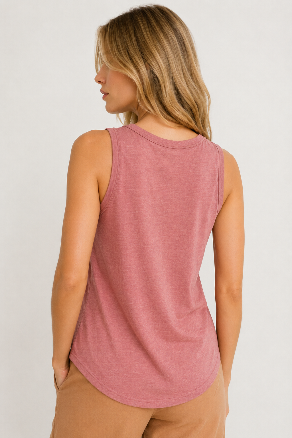 Woman wearing the Lohnr Zarah Tank with a scoop neck and effortless fit