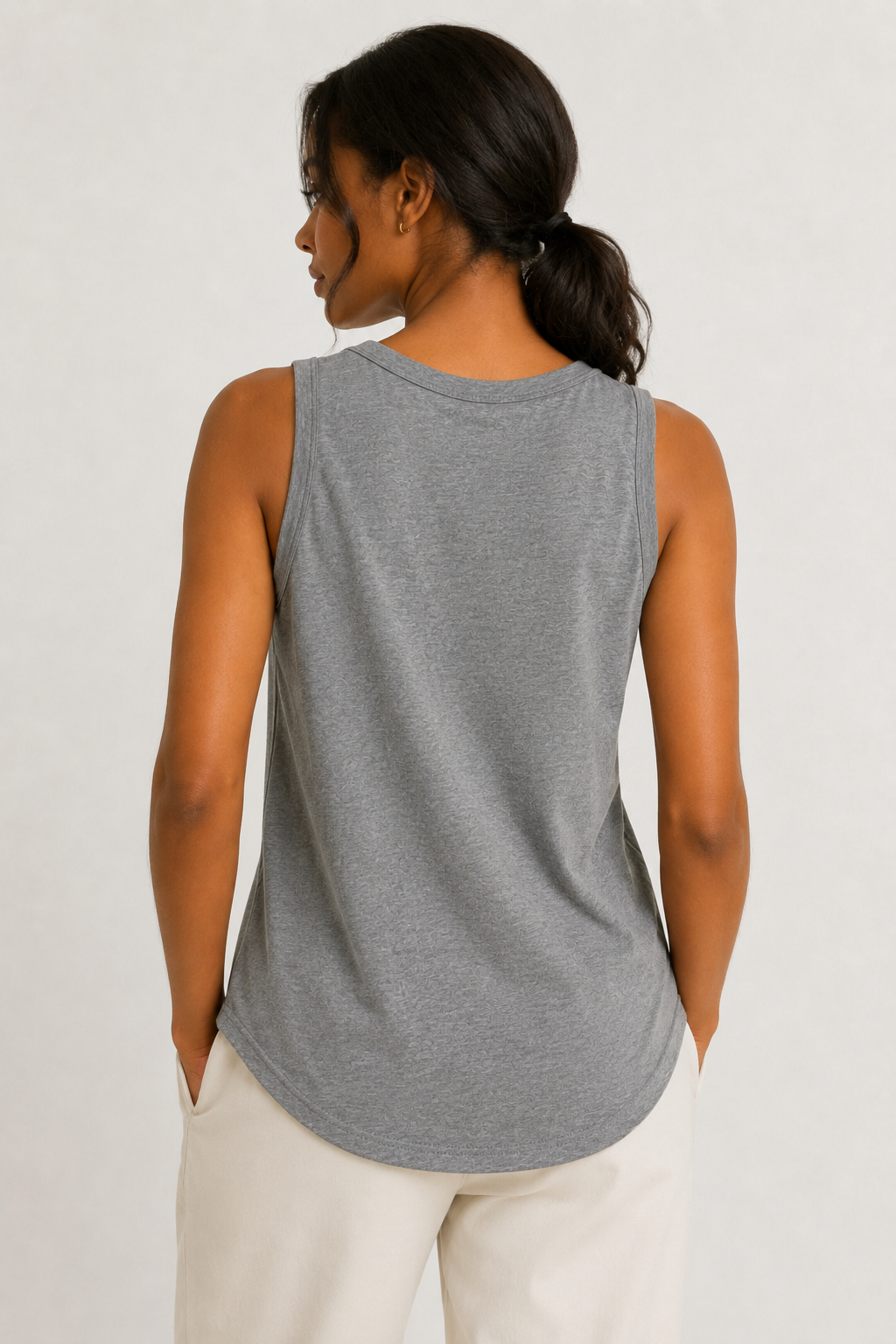 Woman wearing the Lohnr Zarah Tank with a scoop neck and effortless fit