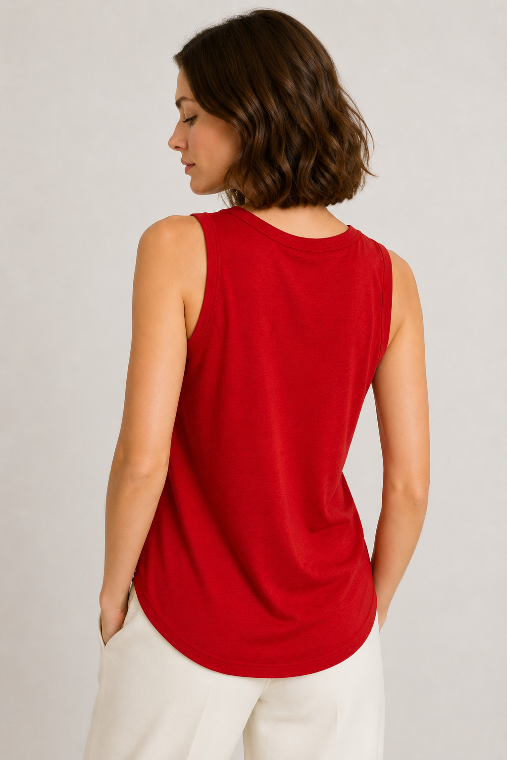 Woman wearing the Lohnr Zarah Tank with a scoop neck and effortless fit