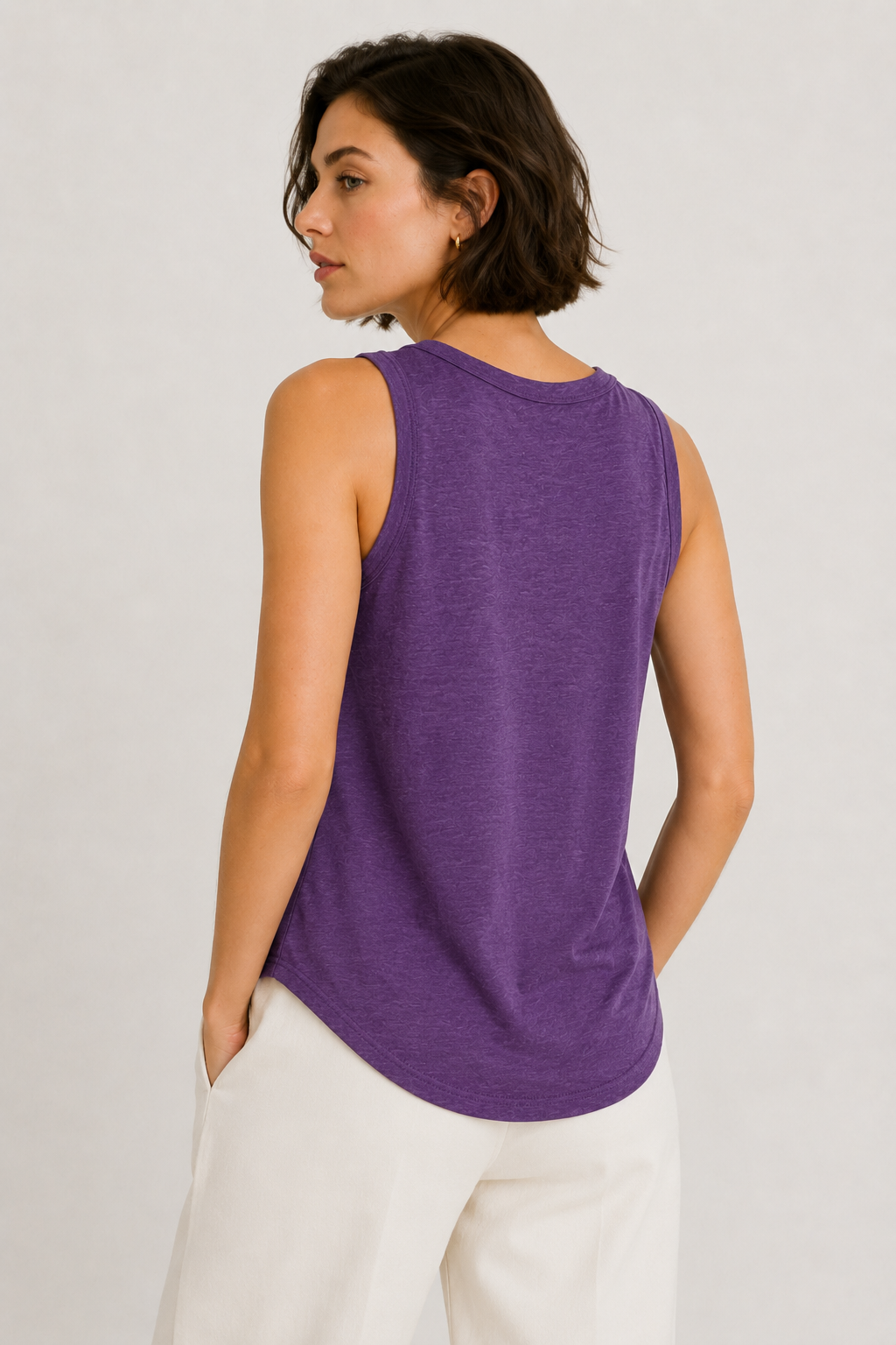 Woman wearing the Lohnr Zarah Tank with a scoop neck and effortless fit